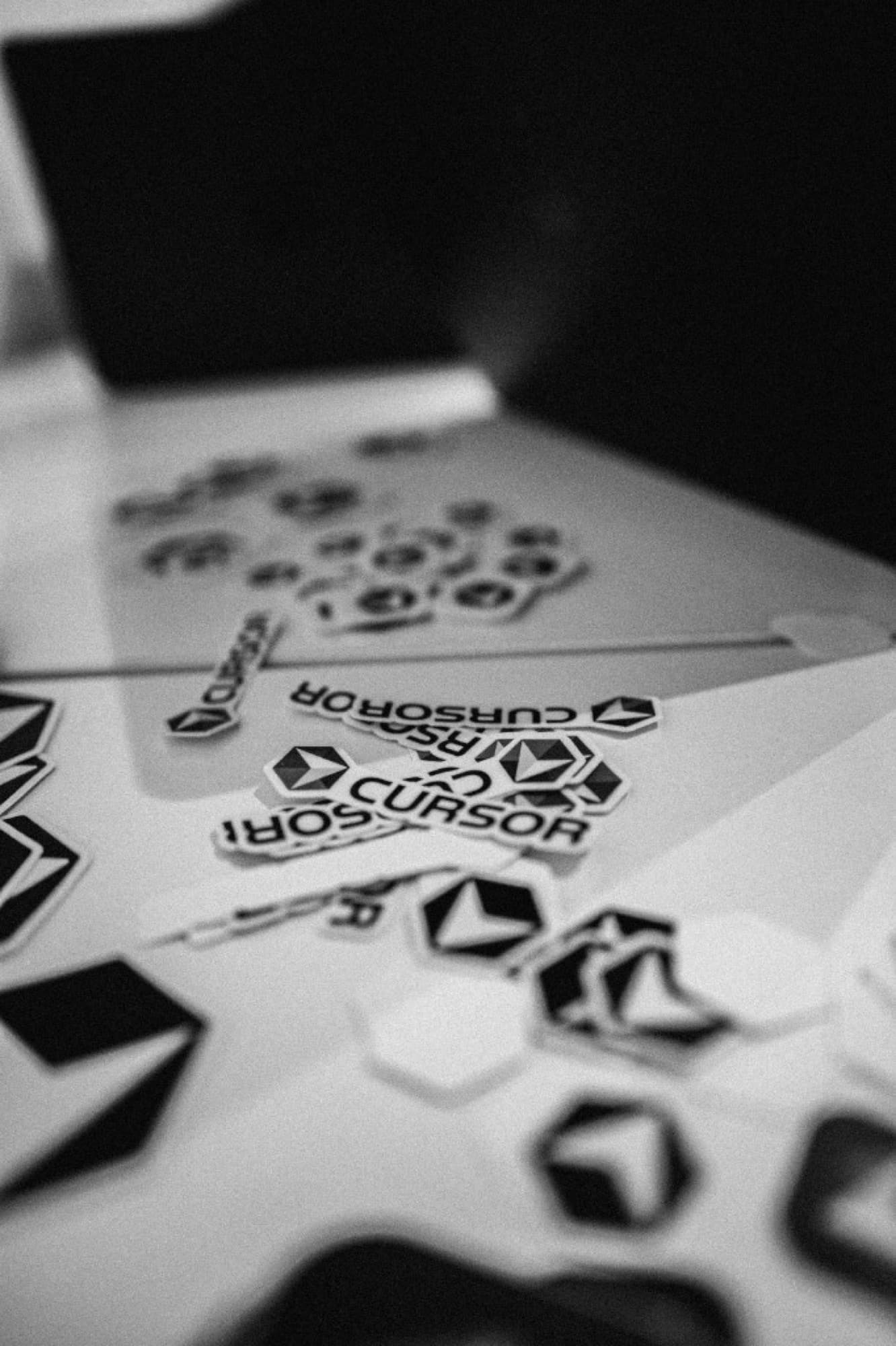 Builders coding at a long table during the event