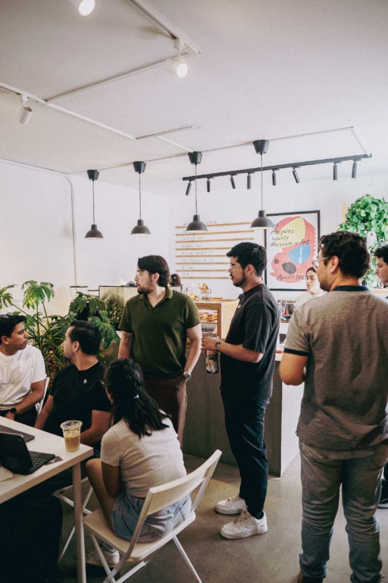 Attendees chatting at the meetup cafe